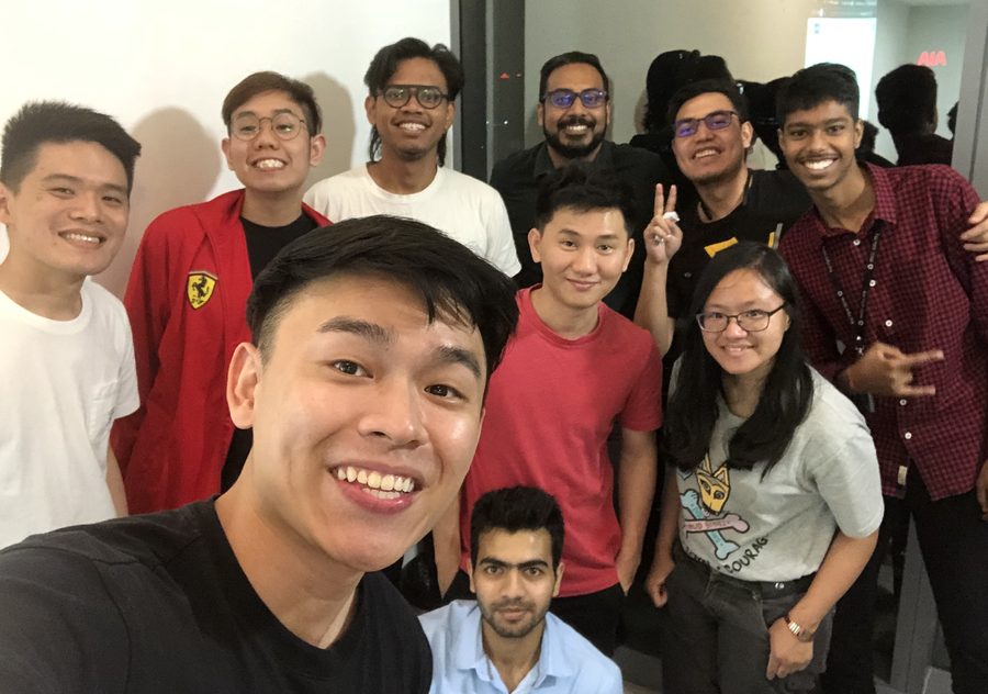 Deric and the first accountability learning group gathered in an office, 2020